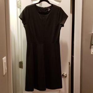 Little black dress with lace detail at neckline